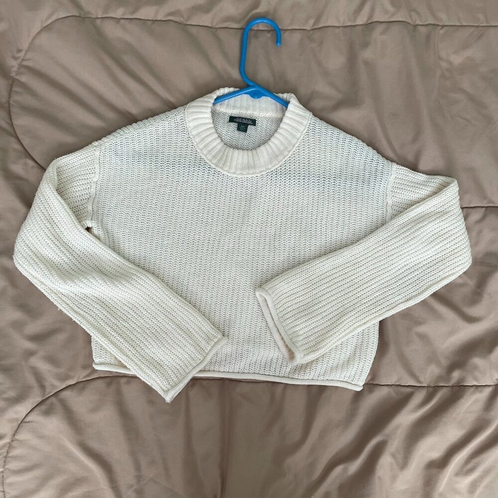 crop sweater. Rolled hem.  Cream color. Also fits small and xs.